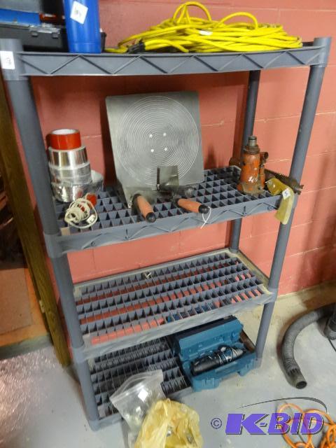 lot 103 image: Plastic Shelf Unit 34 X 14 X 56 No Contents...