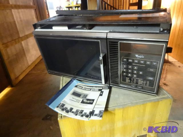 lot 148 image: Whirlpool Microwave Hood Combo. Model HG6700X...