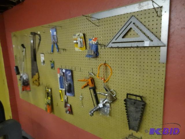 lot 156 image: 4 X 8 Sheet of Peg Board with Hooks Buyer Rem...