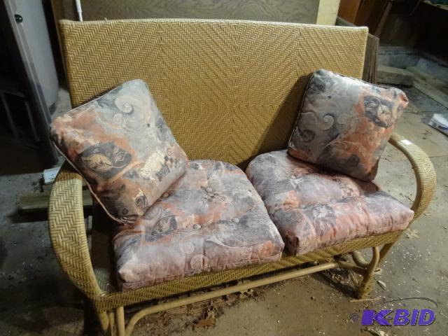 lot 22 image: Metal Frame Wicker Glider Rocker. 51 X 24 X 3...