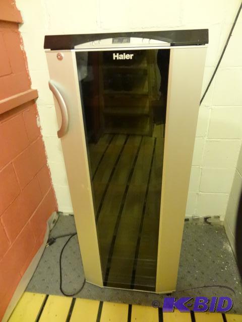 lot 283 image: Haier Wine Cooler. Holds 25 Bottles. HVRO49BL...