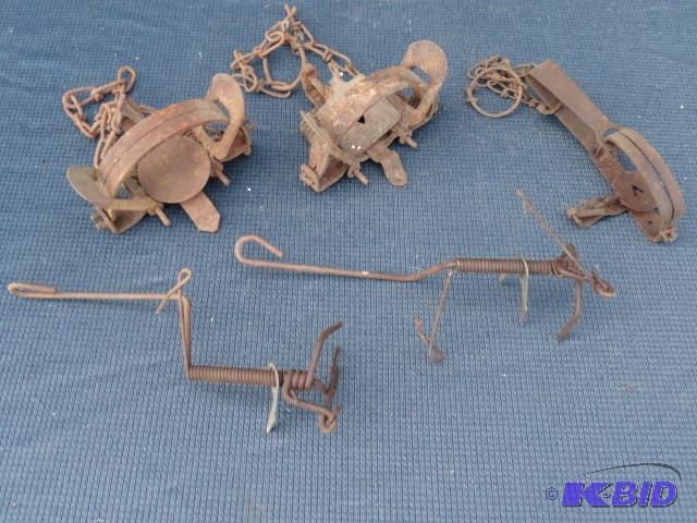lot 104 image: Victor traps with one 0...