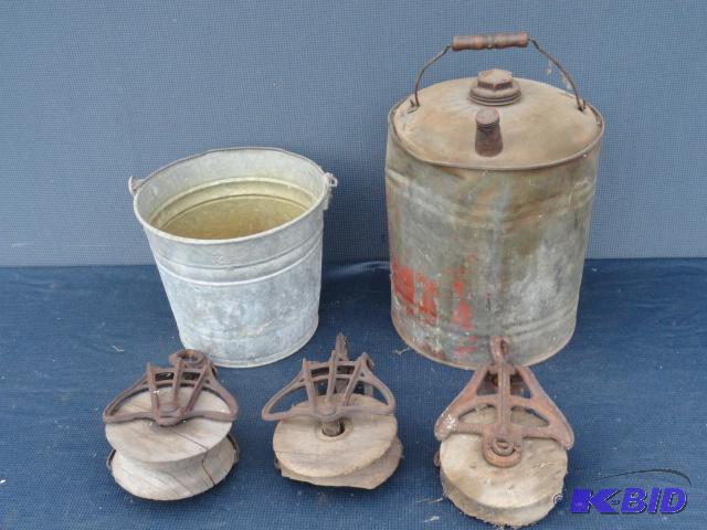 lot 105 image: Barn pulleys, one marked Hudson, pail and pet...