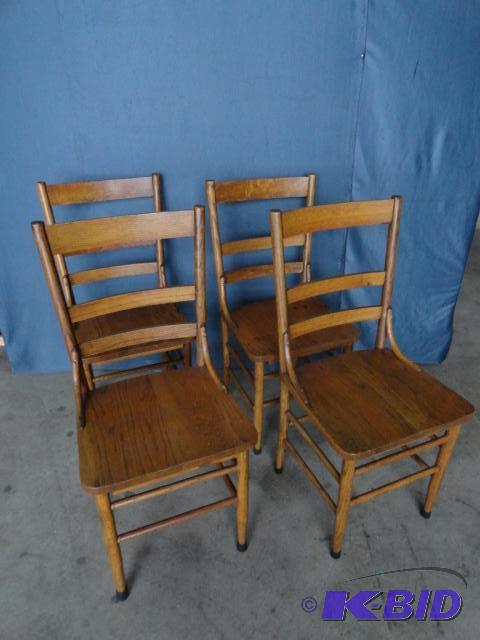 lot 114 image: Golden oak ladder back chairs, 4 total...