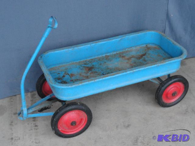 lot 118 image: Steel wagon with solid rubber tires...