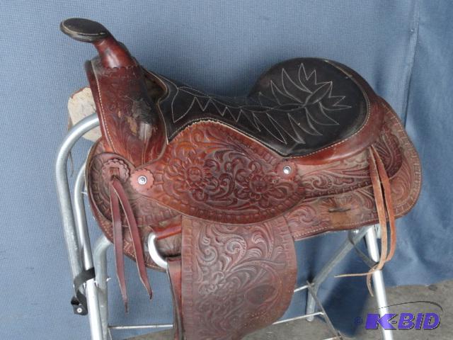 lot 145 image: Fancy saddle 15", unbroken, has some dam...