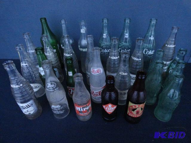 lot 180 image: Vintage glass soda bottles Coke, Nesbitts, ...