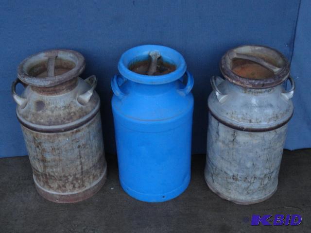 lot 203 image: Three milk cans, unmarked...