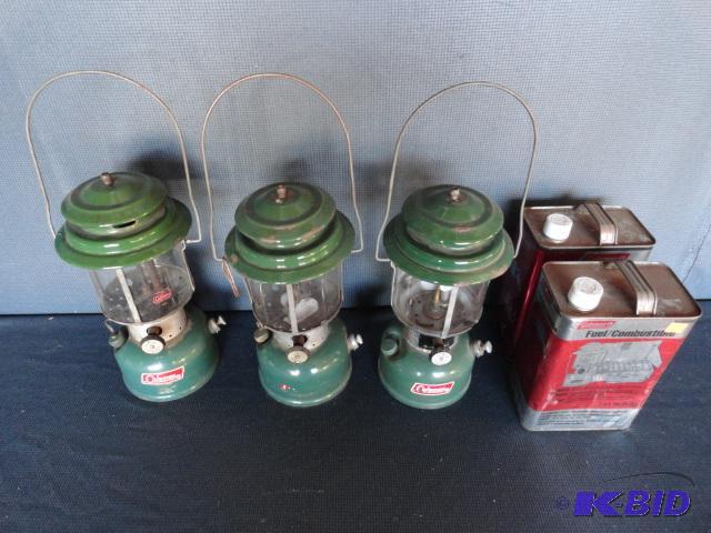 lot 222 image: Coleman lanterns 64, 66, 74 with 2 gallons o...