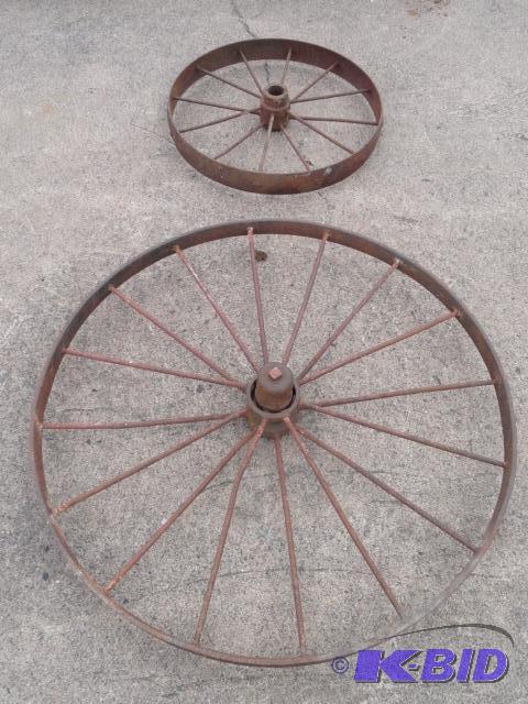 lot 24 image: Pair of steel wheels 25" and 40"...