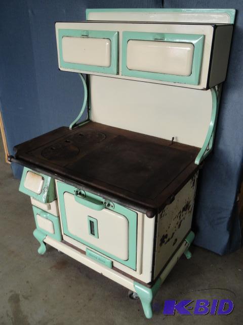 lot 37 image: South Bend cast iron cookstove #13182, cream...