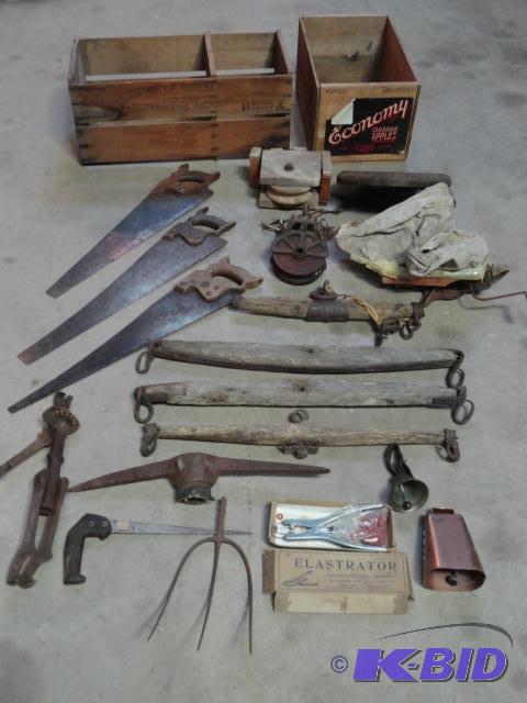 lot 67 image: Early farm items milk stool seat, barn pulle...