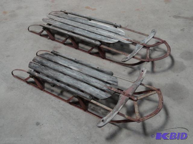 lot 68 image: Pair of sleds, 46" and 52" long...