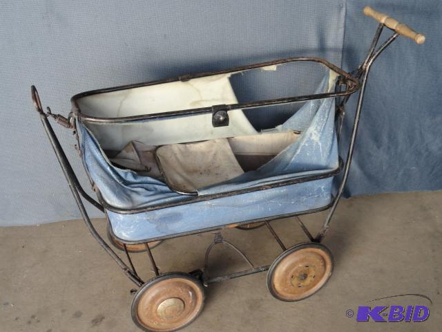 lot 86 image: Metal frame baby cribstroller, hubcaps marke...