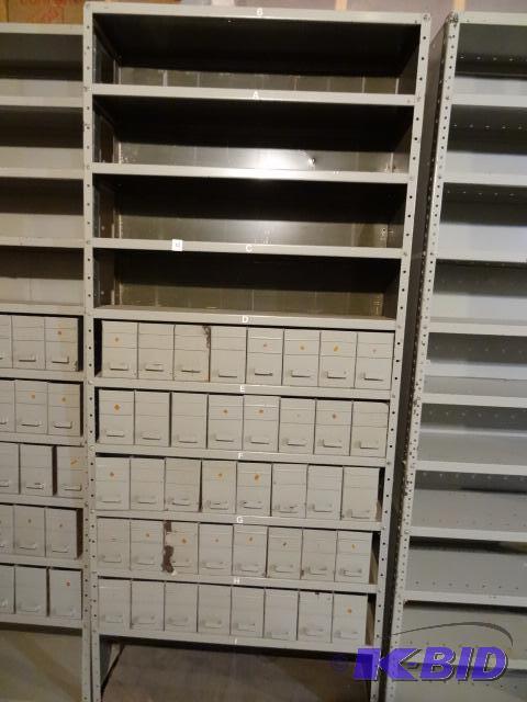 lot 10 image: Metal Shelving Unit with 40 Metal Hardware Bi...