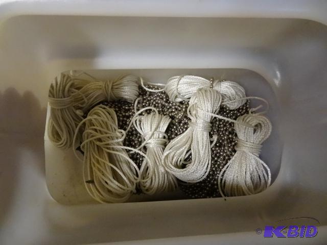 lot 22 image: Bin of Rope and Metal Pull Chain...