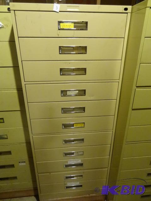 lot 3 image: 11 Drawer Metal Parts Cabinet. Mounted on Woo...