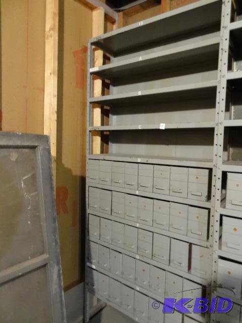 lot 9 image: Metal Shelving Unit with 40 Metal Hardware Bi...