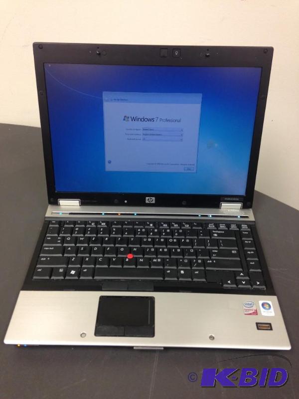 lot 1 image: HP EliteBook 6930P Personal Laptop Runs Wind...