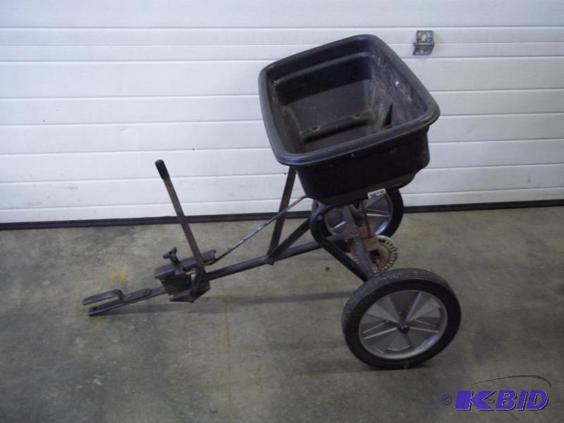 Huskee 70# pull behind spreader...