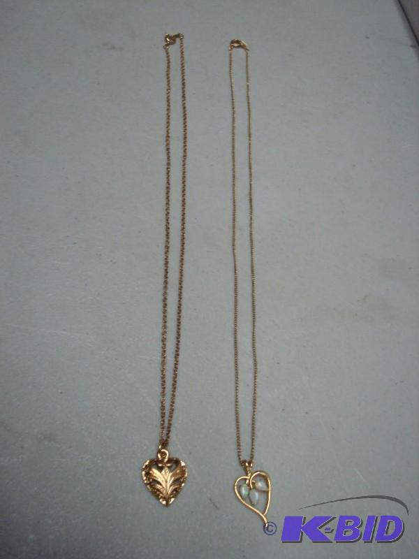 Pair Of Gold Tone Necklaces...