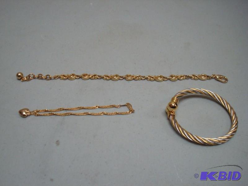 Lot Of Gold Tone Bracelets...