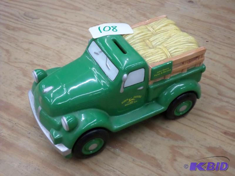 lot 108 image: John Deere Coin Truck Bank...