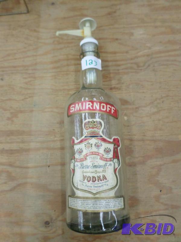 lot 123 image: Smirnoff Vodka 1-Gallon Glass Bottle With Dis...