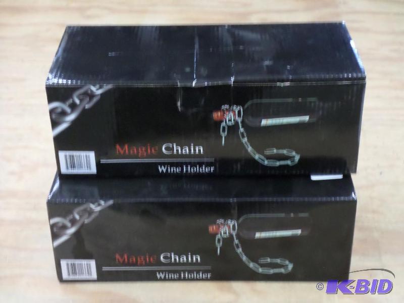 lot 126 image: (2) New Magic Chain Wine Holders...
