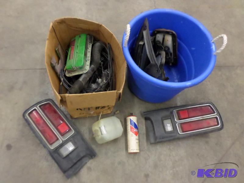 lot 21 image: (1) Box & (1) Tote Of Misc Datsun Car Par...