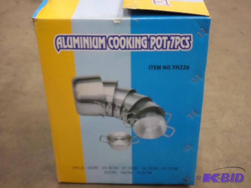 lot 49 image: Unused 7-Piece Aluminum Cooking Pot Set...