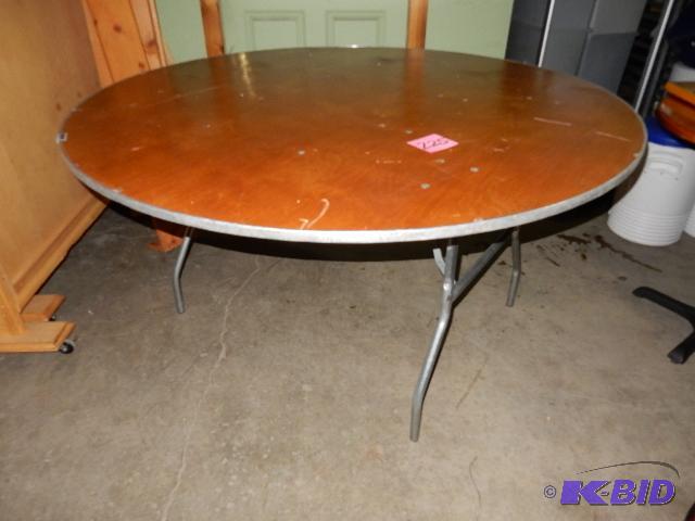 1, 5ft diameter folding round banquet table. ...