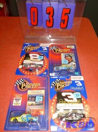 4 Dale Earnhardt die cast cars. As shown. Ter...