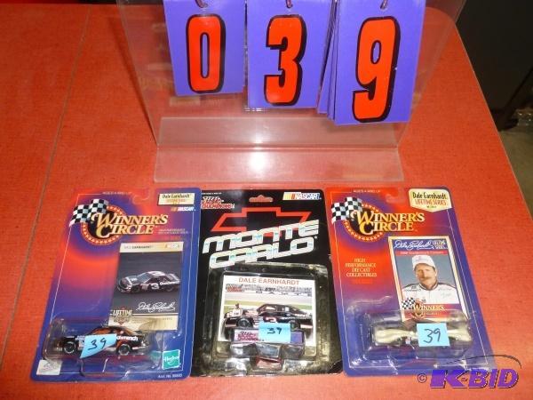3 Dale Earnhardt die cast cars. As shown. Ter...