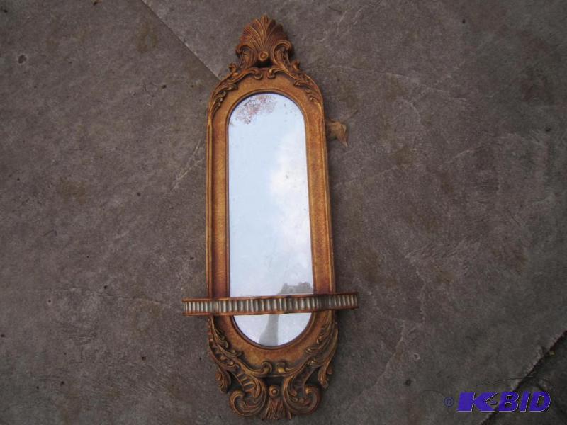 Mirror with shelf
