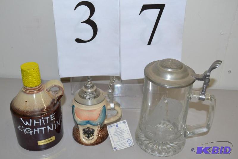 lot 37 image: Steins and White Lightning jug
