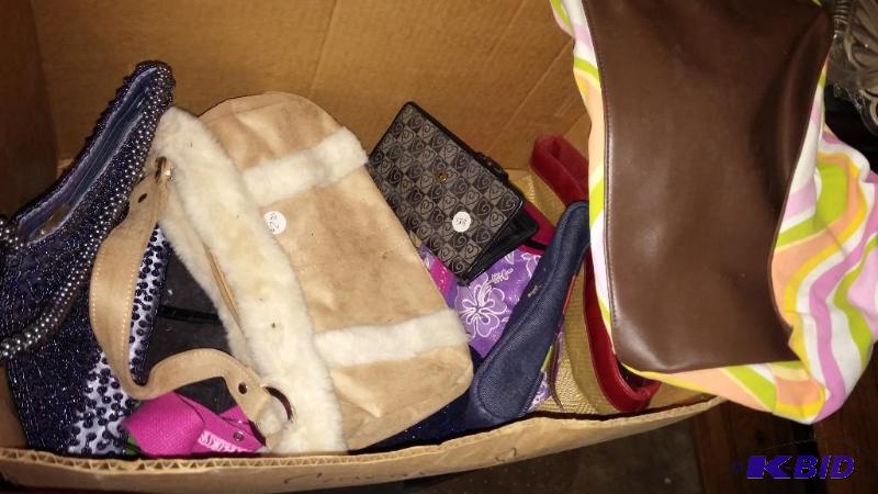 Lot of purses and wallets...