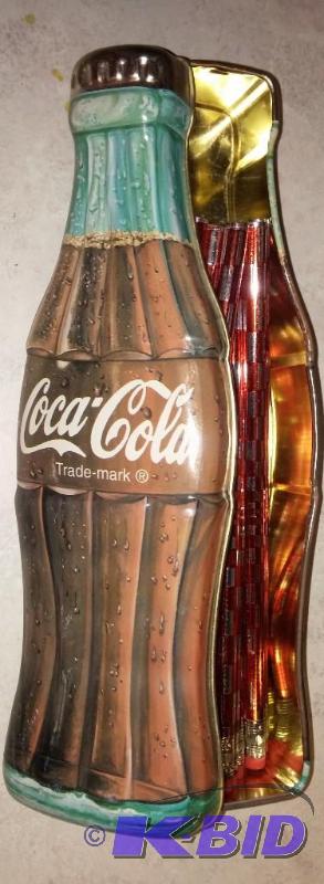Collectable Coke tin with pencils...