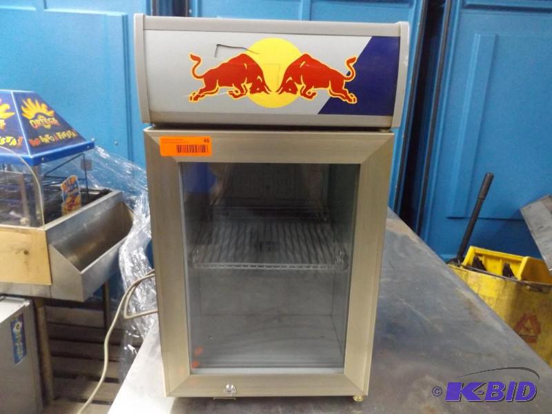 lot 46 image: Red Bull Refrigerator unit. plugged in and ru...