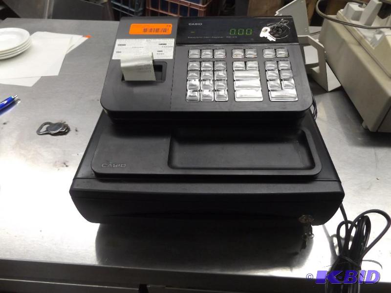 lot 79 image: Casio Cash Register, powers up, has key...