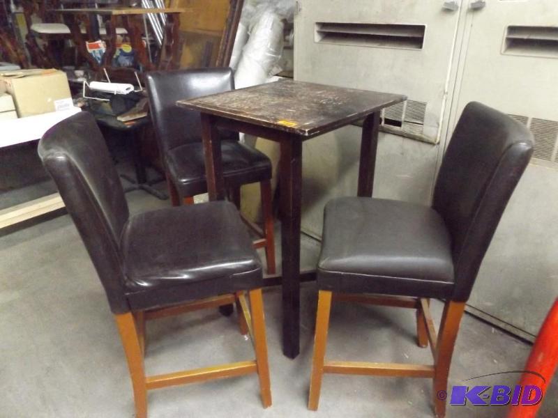 lot 85 image: Bar height table and three leather bar-height...