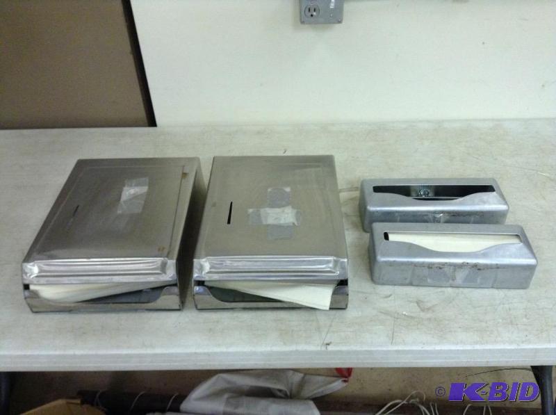lot 48 image: Four Stainless Towel Holders