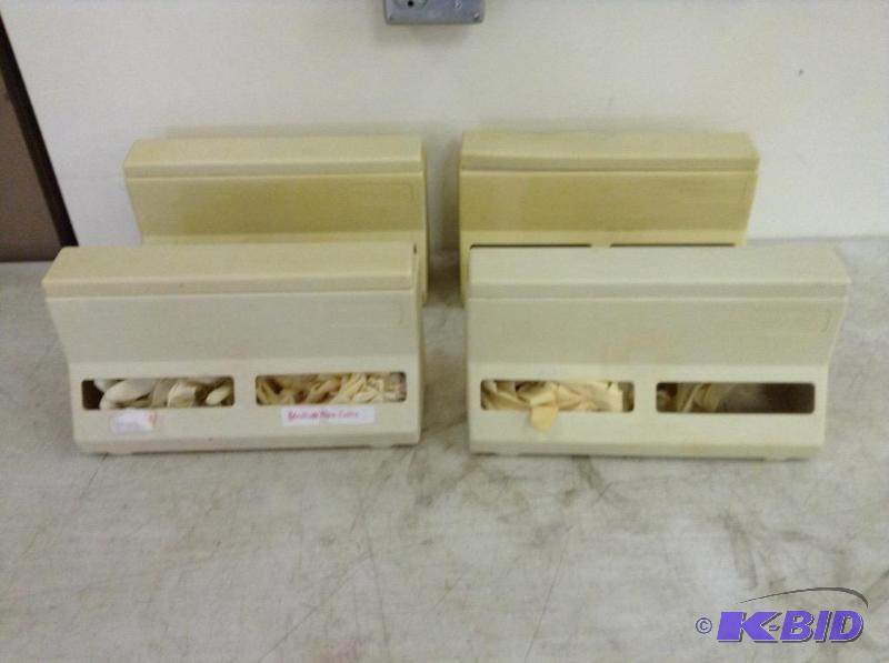 lot 54 image: Four Plastic Wall Hanging Glove Holders