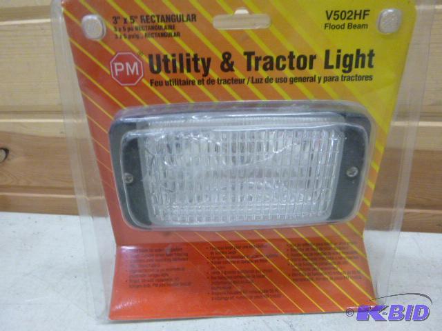 lot 130 image: PM Utility & Tractor Light Cracked lens -...
