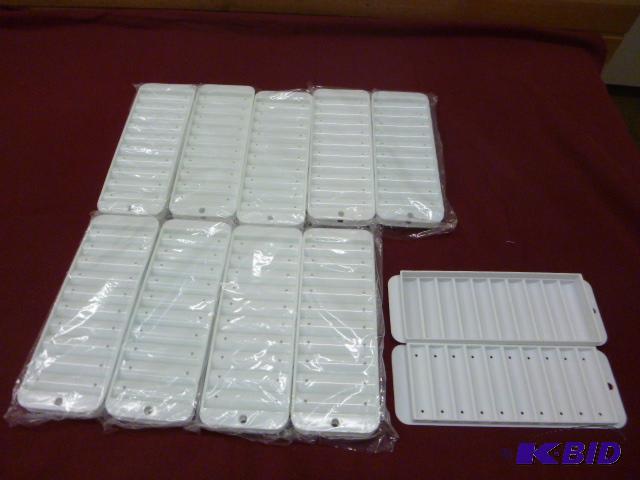 lot 137 image: Ten Narrow Ice Cube Trays for Bottles...