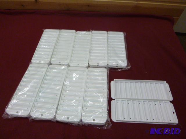 lot 138 image: Ten Narrow Ice Cube Trays for Bottles...