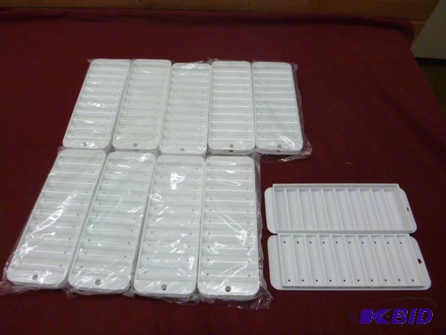lot 139 image: Ten Narrow Ice Cube Trays for Bottles...