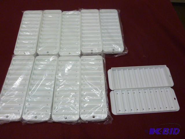 lot 140 image: Ten Narrow Ice Cube Trays for Bottles...