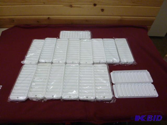 lot 143 image: 16 Narrow Ice Cube Trays for Bottles...