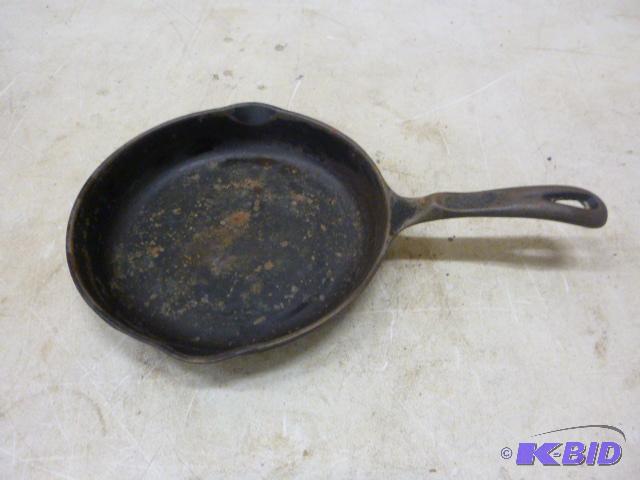 lot 204 image: 9" Cast Iron Skillet...